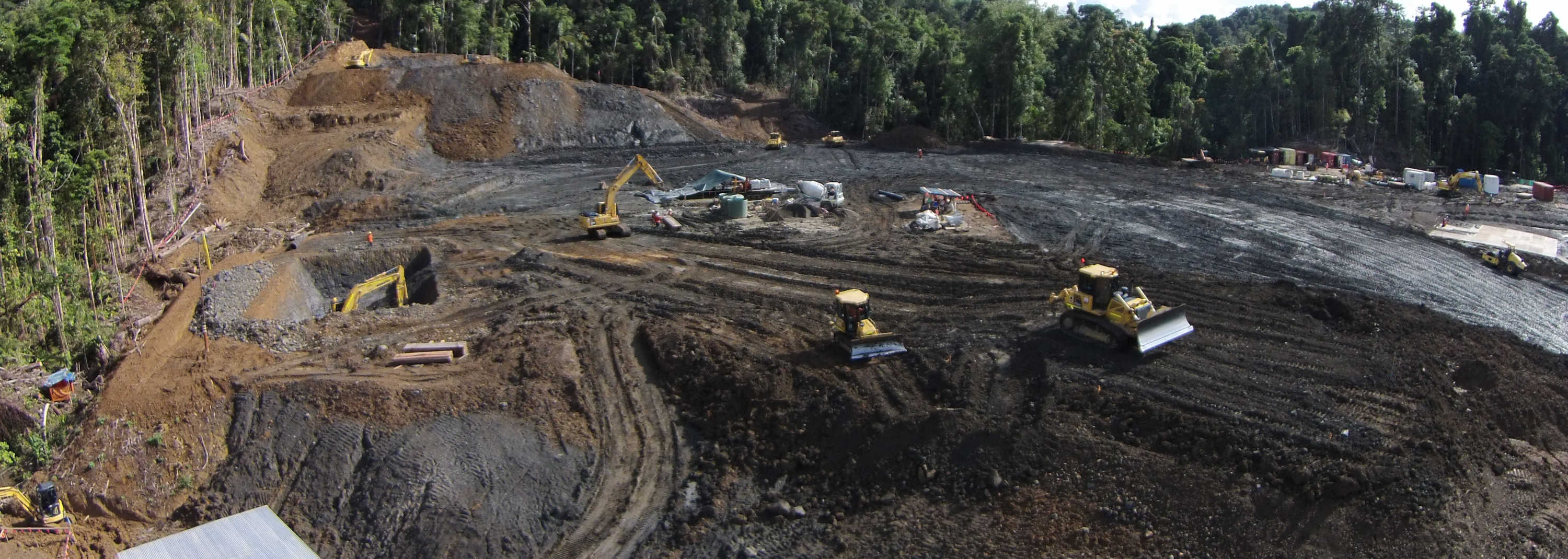 Machines at work in rough terrain in Papua New Guinea
